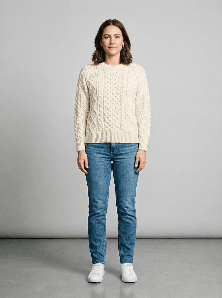 Virtual try-on result: a cream cable-knit sweater fitted onto a model photo with Google Virtual Try-On