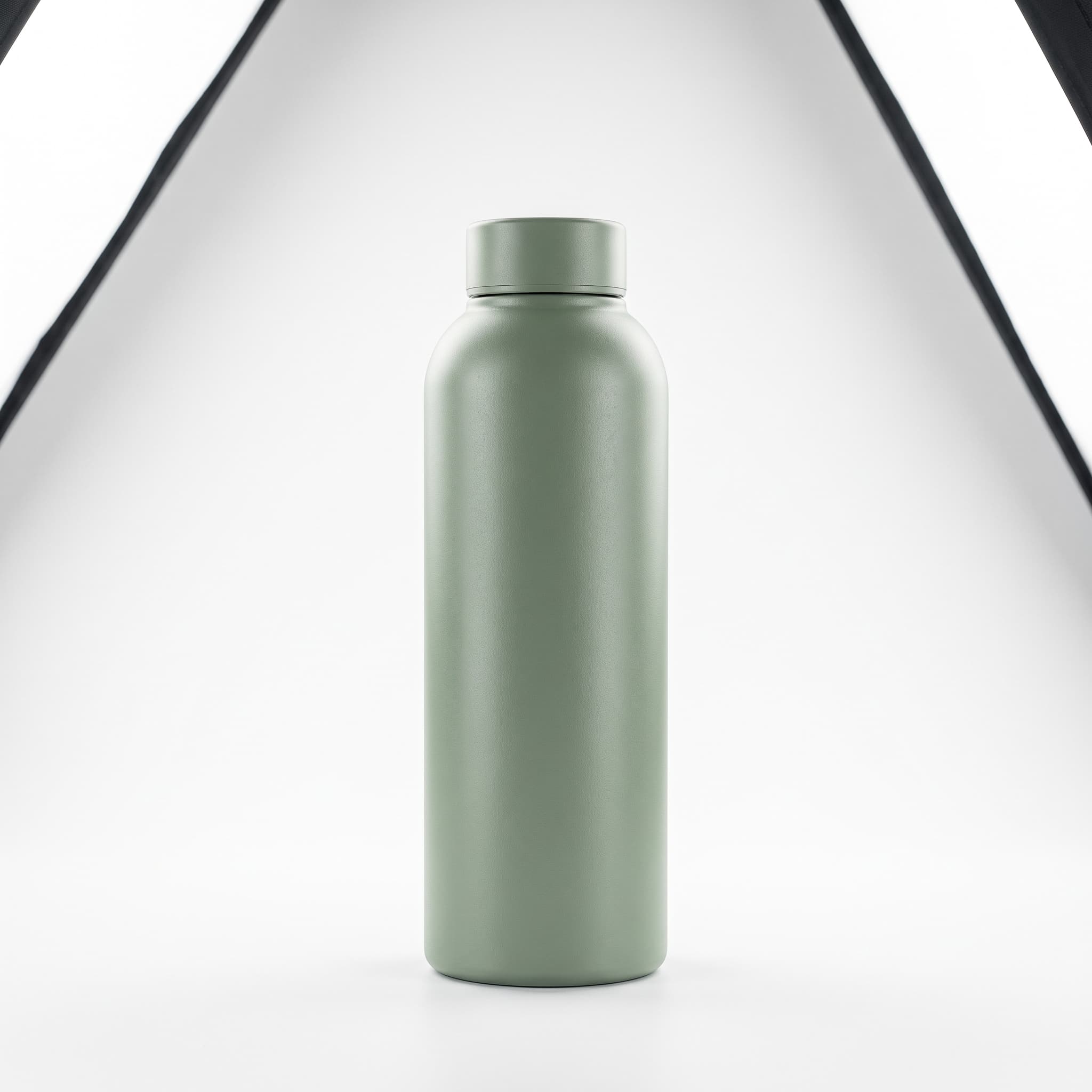 Unbranded matte steel water bottle centred on a seamless white studio background